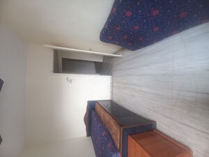 Bedroom in Studio Apartment at Vanrai Shopping Premises, Goregaon East – for Rent