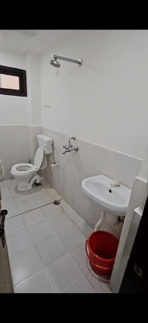 Bathroom in 1 BHK Apartment at Chhatikara – for Sale