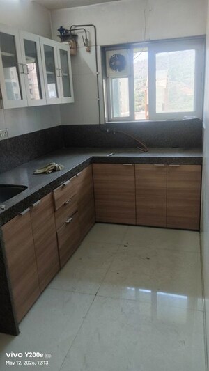 Kitchen in 2 BHK Apartment at Kanakia Spaces Niharika, Manpada – for Rent