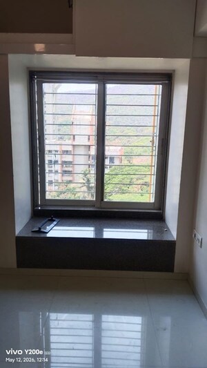 Room in 2 BHK Apartment at Kanakia Spaces Niharika, Manpada – for Rent