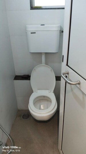 Bathroom in 2 BHK Apartment at Kanakia Spaces Niharika, Manpada – for Rent