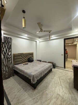 Bedroom in 3 BHK Builder Floor at South Extension ii – for Rent
