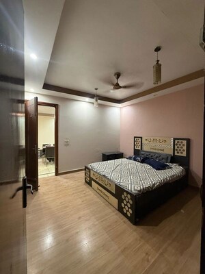 Bedroom in 3 BHK Builder Floor at South Extension ii – for Rent