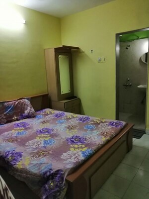 Bedroom in 3 BHK Apartment at Riddhi Enclave Co-op Housing Society Ltd, Viman Nagar – for Rent
