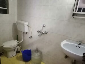 Bathroom in 3 BHK Apartment at Riddhi Enclave Co-op Housing Society Ltd, Viman Nagar – for Rent