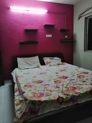 Bedroom in 3 BHK Apartment at Riddhi Enclave Co-op Housing Society Ltd, Viman Nagar – for Rent