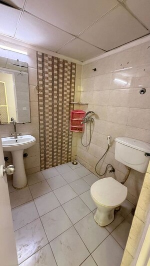 Bathroom in 3 BHK Apartment at Gaur City 2 - 12th Avenue, Sector 16c Greater Noida – for Sale