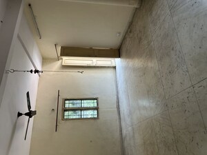 Building Lobby in 2 BHK Apartment at RWA Jalvayu Vihar, Sector 25 – for Rent