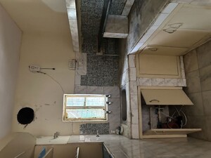 Kitchen in 2 BHK Apartment at RWA Jalvayu Vihar, Sector 25 – for Rent