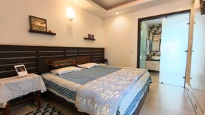 Bedroom in 4 BHK Builder Floor at Sarvodaya Enclave – for Sale