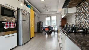 Kitchen in 4 BHK Builder Floor at Sarvodaya Enclave – for Sale