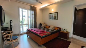 Bedroom in 4 BHK Builder Floor at Sarvodaya Enclave – for Sale