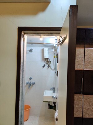 Bathroom in 2 BHK Apartment at Vile Parle West – for Rent