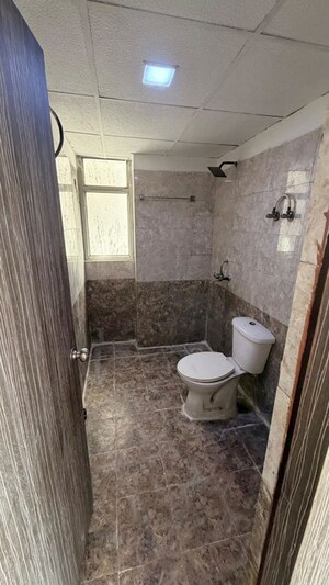 Bathroom in 2 BHK Apartment at Gaur City 2 - 11th Avenue, Sector 16c Greater Noida – for Sale