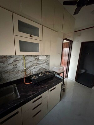 Kitchen in 1 BHK Apartment at Sitesh Pearl Heights, Parel – for Rent