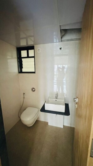 Bathroom in 3 BHK Apartment at Kohinoor Viva City, Dhanori – for Rent