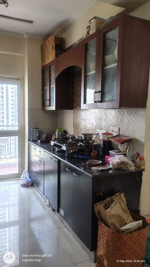 Kitchen in 2 BHK Apartment at Aims Golf City, Sector 75 – for Rent