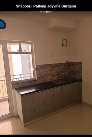 Kitchen in 3 BHK Apartment at Shapoorji Pallonji Joyville Gurgaon, Sector 102 – for Sale