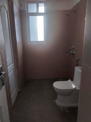 Bathroom in 2 BHK Apartment at Ansal Sushant Jeevan Enclave, Sushant Golf City – for Rent
