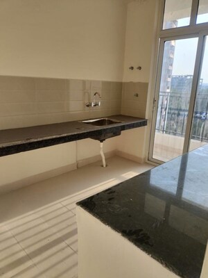 Kitchen in 2 BHK Apartment at Ansal Sushant Jeevan Enclave, Sushant Golf City – for Rent