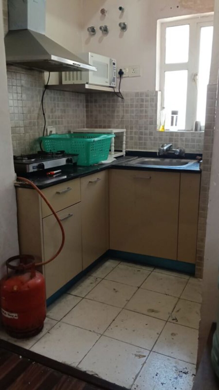 Kitchen, arun-vihar 1 Bedroom 800 Sq.Ft. Apartment In Sector 29 Noida 10392487