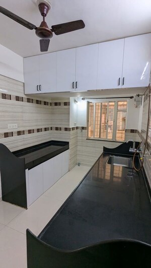 Kitchen in 2 BHK Apartment at Pimple Saudagar – for Sale