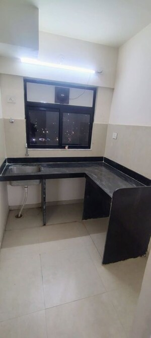 Kitchen in 1 BHK Apartment at Runwal Gardens, Dombivli East – for Rent