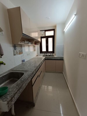 Kitchen in 2 BHK Apartment at Sainik Farm – for Rent