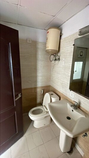 Bathroom in 3 BHK Apartment at Nimbus The Hyde park, Sector 78 – for Rent