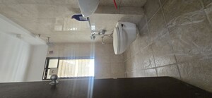 Bathroom in 2 BHK Apartment at Pride World City Brooklyn, Charholi Budruk – for Rent