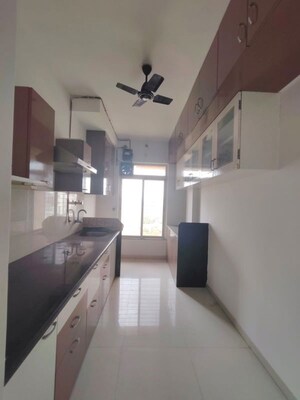 Kitchen in 2 BHK Apartment at Puranik City, Kasarvadavali – for Sale