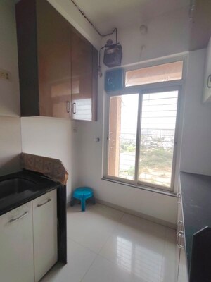 Kitchen in 2 BHK Apartment at Puranik City, Kasarvadavali – for Sale