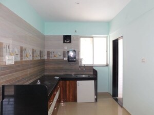 Kitchen in 2 BHK Apartment at LS Mehetre Laxmi Horizon, Punawale – for Rent