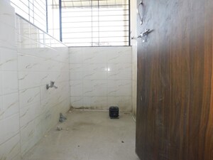 Bathroom in 2 BHK Apartment at LS Mehetre Laxmi Horizon, Punawale – for Rent
