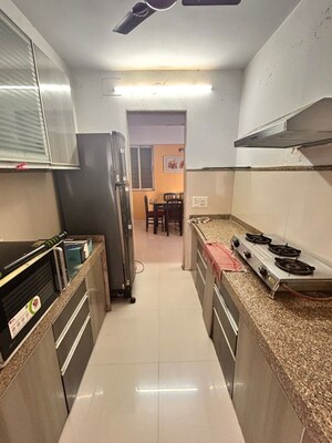 Kitchen in 1 BHK Apartment at Kamanwala Manavstal, Malad West – for Sale