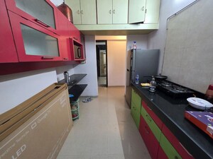 Kitchen in 1 BHK Apartment at Kamanwala Manavstal, Malad West – for Sale
