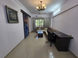Living Room in 1 BHK Apartment at Kamanwala Manavstal, Malad West – for Sale