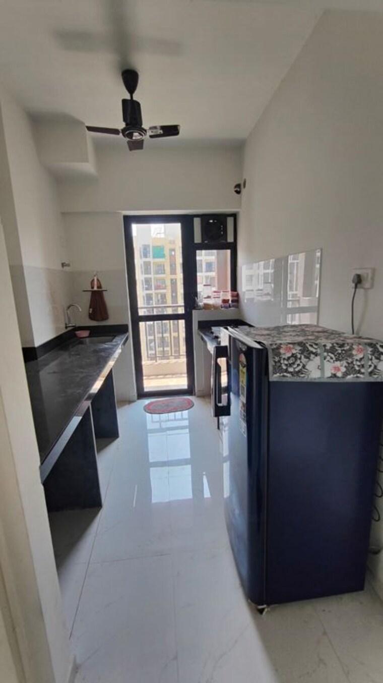 Kitchen, runwal-gardens-phase-2 1.5 Bedroom 505 Sq.Ft. Apartment In Dombivli East Thane 10393101