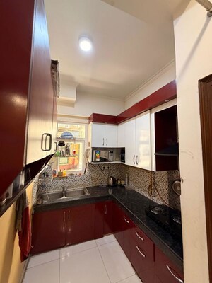 Kitchen in 3 BHK Apartment at Patel Neotown, Tech Zone 4 Greater Noida – for Rent