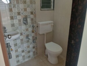 Bathroom in 1 BHK Apartment at Bindra Complex, Andheri East – for Rent
