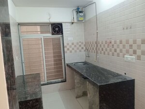 Kitchen in 1 BHK Apartment at Bindra Complex, Andheri East – for Rent