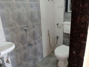 Bathroom in 1 BHK Apartment at Bindra Complex, Andheri East – for Rent
