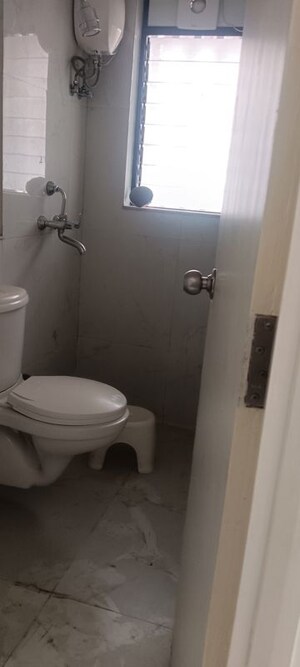 Bathroom in 1 BHK Apartment at Runwal Gardens, Dombivli East – for Sale