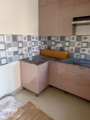 Kitchen in 2 BHK Apartment at Aims Golf City, Sector 75 – for Rent