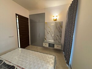 Bedroom in 2.5 BHK Builder Floor at Smart World Orchard, Sector 61 – for Rent