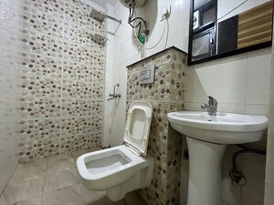 Bathroom in 2 BHK Apartment at Palm Residency Chhatarpur, Chattarpur – for Rent