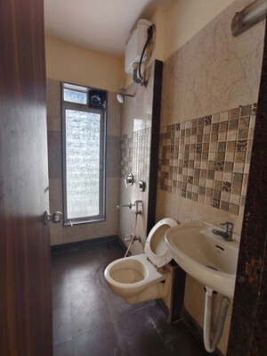 Bathroom in 1 BHK Apartment at Keytech Ashok Smruti, Ghodbunder Road – for Rent