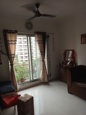 Living Room in 1 BHK Apartment at Cosmos Orchid, Ghodbunder Road – for Rent