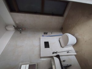 Bathroom in 2 BHK Apartment at Raymond Realty Phase II, Pokhran Road No Two – for Rent