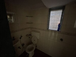Bathroom in 2 BHK Apartment at Sai Shakti CHS Andheri West, Andheri West – for Rent
